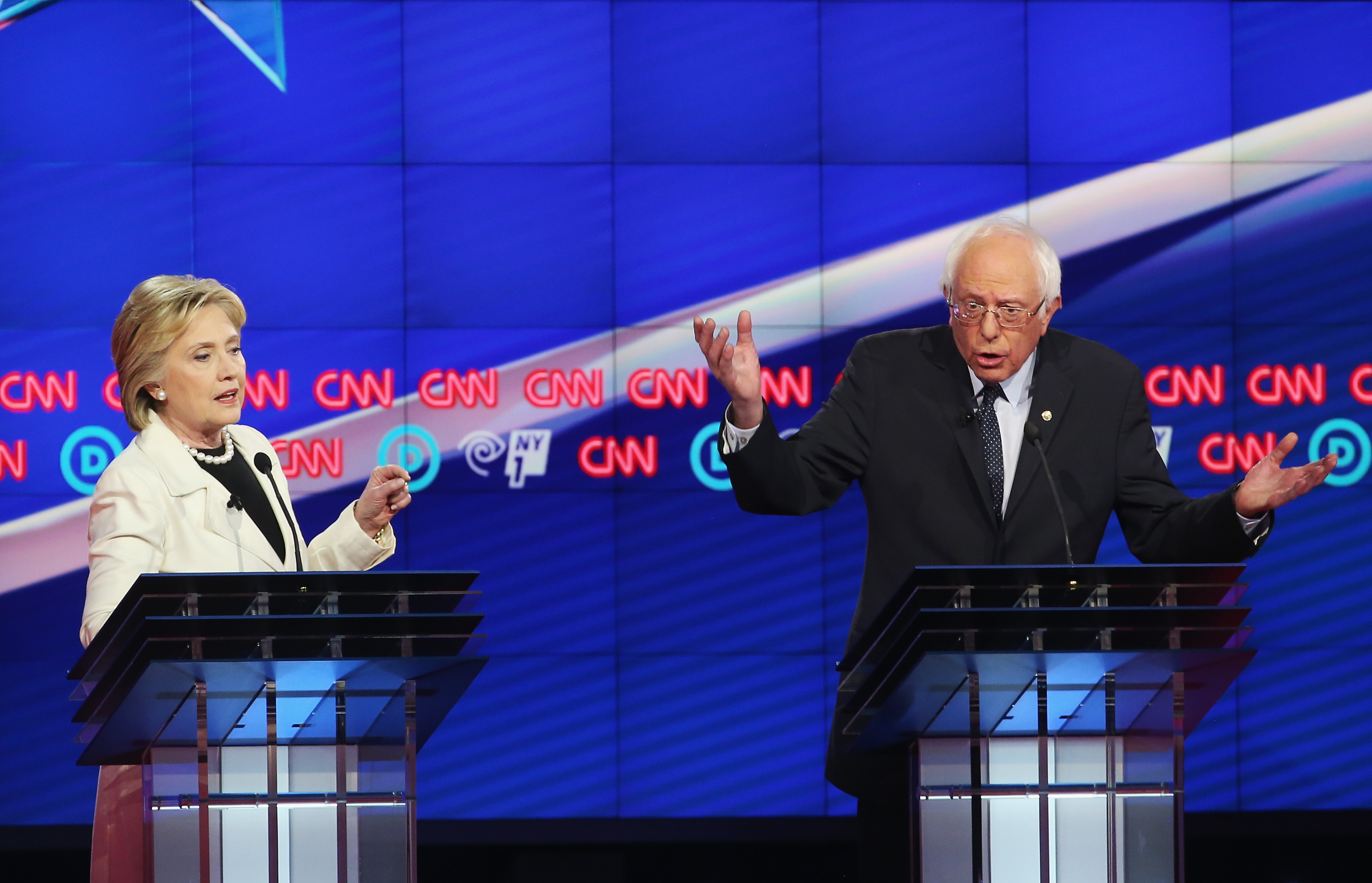 NEW YORK, NY - APRIL 14: Democratic Presidential candidates Hillary Clinton and Sen. Bernie Sanders (D-VT) debate during the CNN Democratic Presidential Primary Debate at the Duggal Greenhouse in the Brooklyn Navy Yard on April 14, 2016 in New York City. The candidates are debating ahead of the New York primary to be held April 19. (Photo by Justin Sullivan/Getty Images)