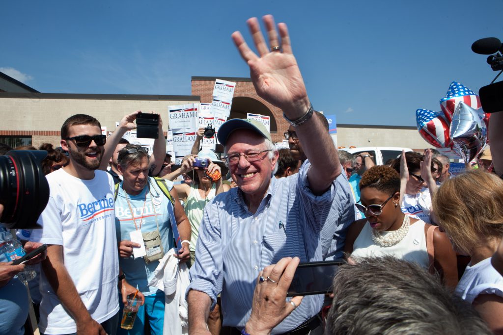 MILFORD, NH - SEPTEMBER 7: Democratic Presidential candidate Bernie Sanders greets supporters at the Labor Day Parade on September 7, 2015, in Milford, New Hampshire. Recent polls have Sanders leading in New Hampshire over Democratic rival Hillary Clinton. (Photo by Kayana Szymczak/Getty Images)