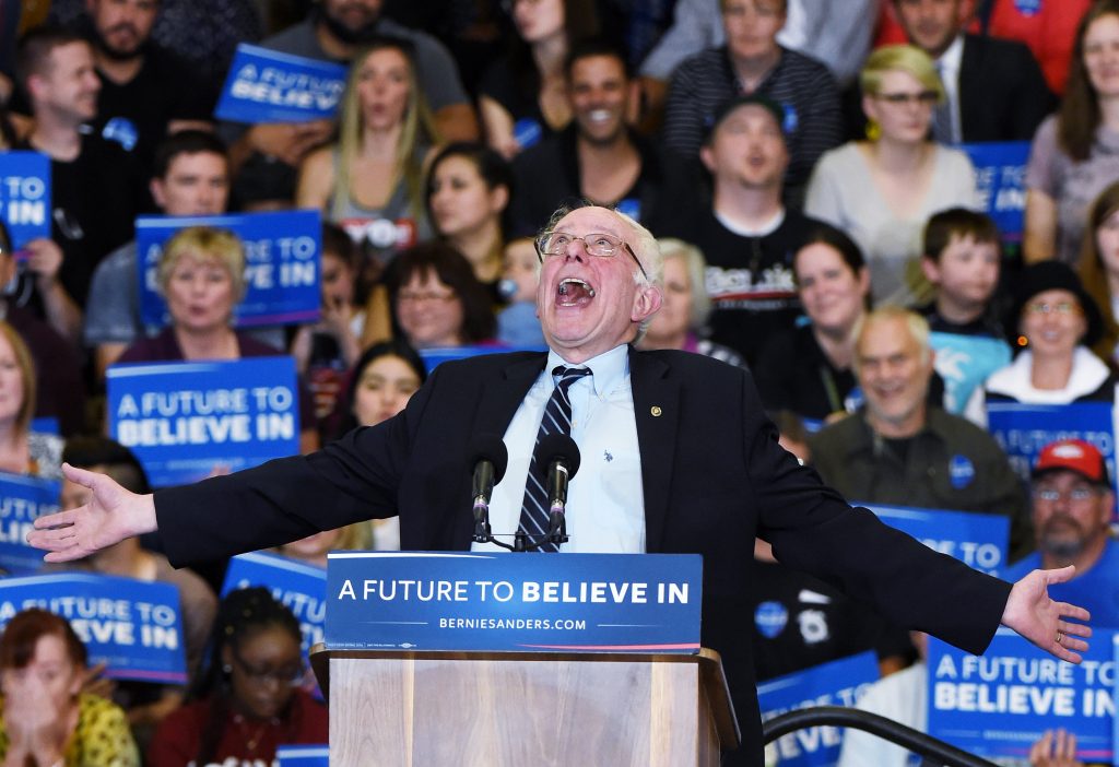 LAS VEGAS, NV - FEBRUARY 14: Democratic presidential candidate Sen. Bernie Sanders (D-VT) jokes around as he speaks during a campaign rally at Bonanza High School on February 14, 2016 in Las Vegas, Nevada. Sanders is challenging Hillary Clinton for the Democratic presidential nomination ahead of Nevada's February 20th Democratic caucus. (Photo by Ethan Miller/Getty Images)