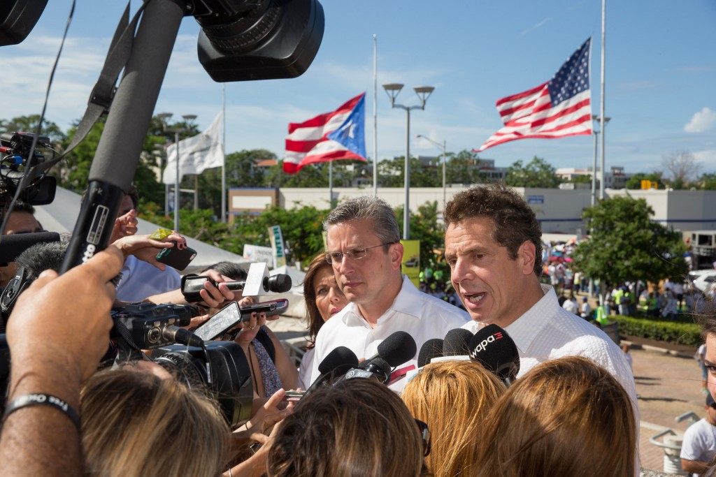New York Governor Andrew Cuomo (right) joined Puerto Rico Governor Alejandro García Padilla during a rally in San Juan.